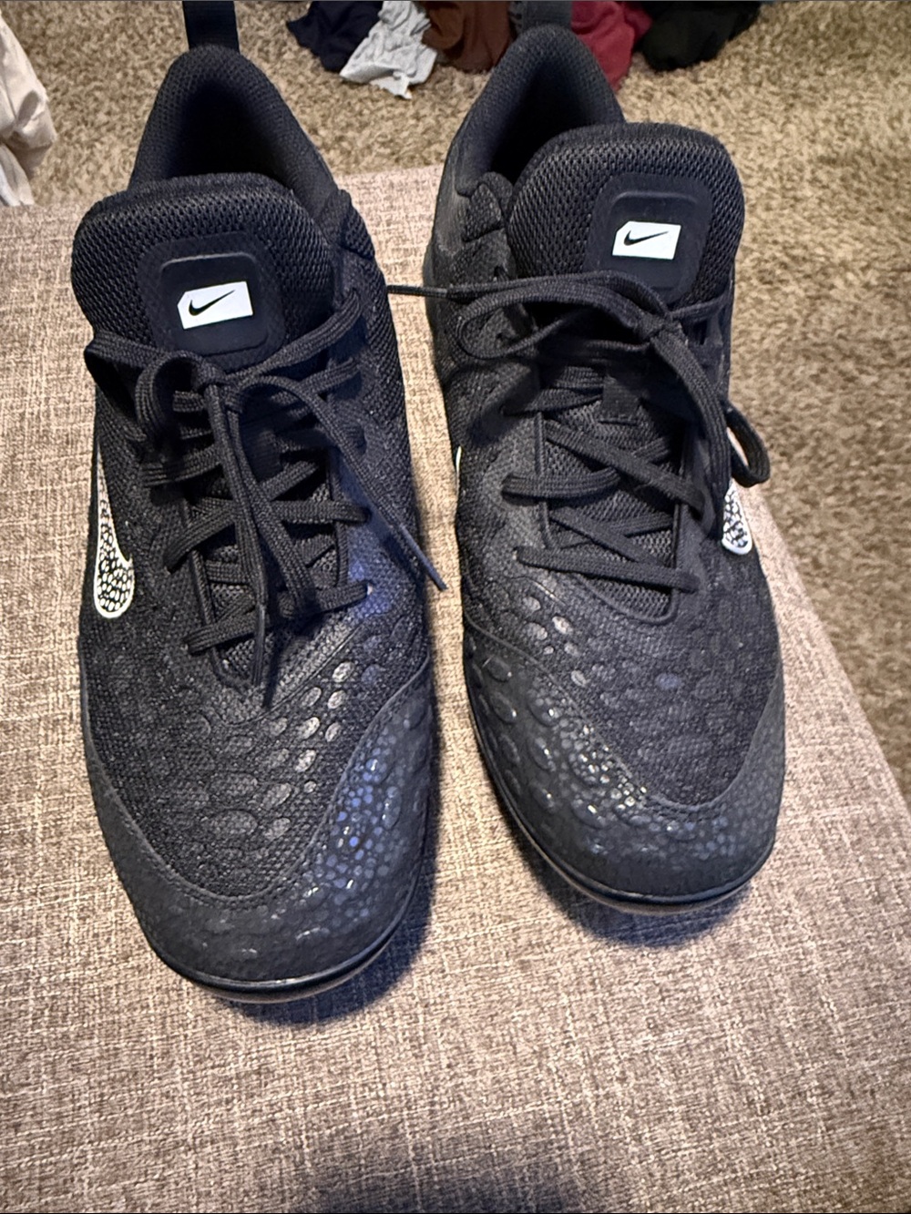Nike Woman’s softball cleats black with white swoosh